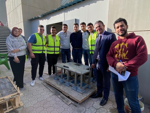 Junior students at the Civil & Construction Engineering program building a real prototype for a reinforced concrete villa using innovative concrete mixes.
